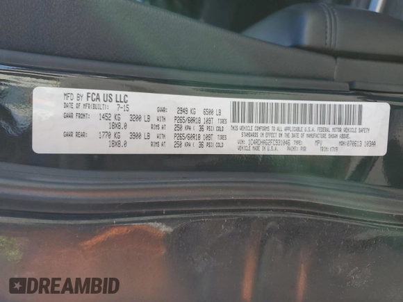 2015 Dodge Durango SXT with VIN 1C4RDHAG2FC931046, listed as a Copart auction lot 52409775 with 164,509 mi miles and Salvage title. Bid and sale history available at DreamBid. Image 13.