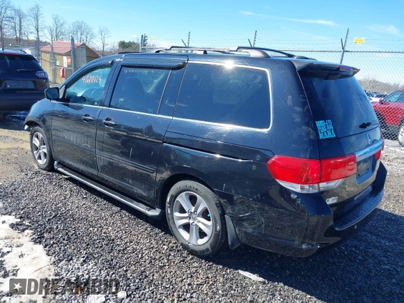2008 Honda Odyssey Touring with VIN 5FNRL38948B029193, listed as a IAAI auction lot 41618424 with 219,964 mi miles. Bid and sale history available at carsss.com. Image 3.