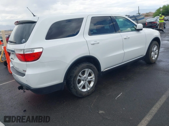 2013 Dodge Durango SXT with VIN 1C4RDJAG7DC659050, listed as a IAAI auction lot 42637236 with 162,458 mi miles and . Bid and sale history available at DreamBid. Image 4.