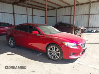 2014 Mazda 6 i Grand Touring with VIN JM1GJ1W64E1145315, listed as a IAAI auction lot 41608127 with 124,924 mi miles. Bid and sale history available at carsss.com. Image 1.