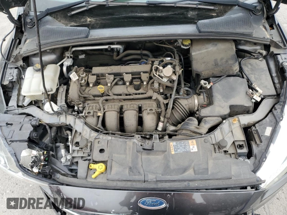 2016 Ford Focus SE z VIN 1FADP3F23GL405565, wystawiony jako Copart lot #60173935 z przebiegiem 82 167 mil mil oraz Szkoda całkowita • Salvage title. Historia ofert i sprzedaży dostępna na DreamBid. Obrazek 11.
