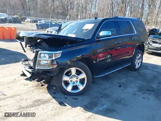 2015 Chevrolet Tahoe LTZ with VIN 1GNSKCKC6FR190314, listed as a IAAI auction lot 41672237 with 176,439 mi miles. Bid and sale history available at carsss.com. Image 2.