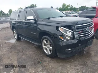 2017 Chevrolet Suburban LT z VIN 1GNSKHKC1HR146981, wystawiony jako IAAI lot #42654442 z przebiegiem 132 656 mil mil oraz . Historia ofert i sprzedaży dostępna na DreamBid. Obrazek 1.