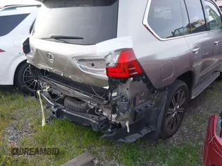 2021 Lexus LX 570 z VIN JTJDY7AX9M4335171, wystawiony jako IAAI lot #41754348 z przebiegiem 32 119 mil mil oraz . Historia ofert i sprzedaży dostępna na DreamBid. Obrazek 16.