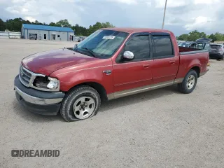 2001 Ford F-150 XLT with VIN 1FTRW076X1KC42302, listed as a Copart auction lot 59868295 with 234,772 mi miles and Salvage title. Bid and sale history available at DreamBid. Image 1.