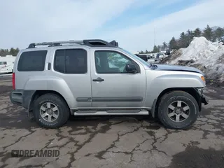 2012 Nissan Xterra S with VIN 5N1AN0NW6CC510015, listed as a IAAI auction lot 41614398 with 123,066 mi miles and . Bid and sale history available at DreamBid. Image 14.