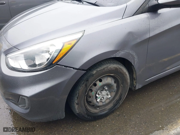 2015 Hyundai Accent GLS with VIN KMHCT4AE0FU927177, listed as a IAAI auction lot 41559026 with 181,703 mi miles. Bid and sale history available at carsss.com. Image 6.