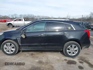 2013 Cadillac SRX Luxury Collection z VIN 3GYFNCE35DS607553, wystawiony jako IAAI lot #42151522 z przebiegiem 104 688 mil mil oraz . Historia ofert i sprzedaży dostępna na DreamBid. Obrazek 14.