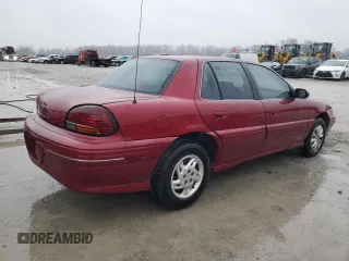 1997 Pontiac Grand Am SE with VIN 1G2NE52T4VC747929, listed as a Copart auction lot 43959975 with 142,673 mi miles and Salvage Title. Bid and sale history available at carsss.com. Image 3.