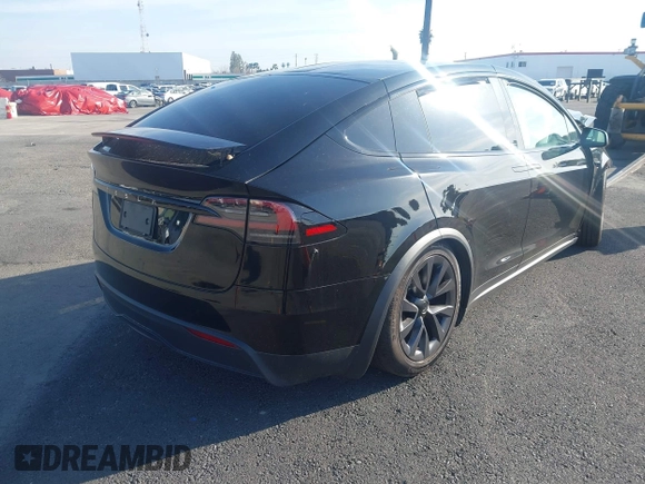 2023 Tesla Model X with VIN 7SAXCDE59PF430836, listed as a IAAI auction lot 41545267 with Not Provided miles and . Bid and sale history available at DreamBid. Image 4.