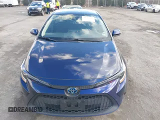 2021 Toyota Corolla Hybrid LE with VIN JTDEAMDE9MJ021431, listed as a IAAI auction lot 41747142 with 165,680 mi miles. Bid and sale history available at carsss.com. Image 12.
