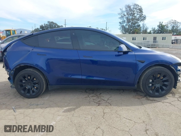 2022 Tesla Model Y Long Range with VIN 7SAYGDEE0NA019067, listed as a IAAI auction lot 41645198 with 49,336 mi miles and . Bid and sale history available at DreamBid. Image 14.