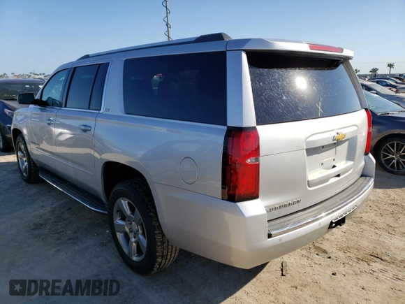 2016 Chevrolet Suburban LTZ with VIN 1GNSKJKC2GR433297, listed as a Copart auction lot 65443682 with Not Provided miles and . Bid and sale history available at DreamBid. Image 3.