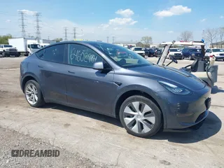 2022 Tesla Model Y Long Range with VIN 7SAYGDEE3NA007737, listed as a IAAI auction lot 42128359 with 42,597 mi miles and . Bid and sale history available at carsss.com. Image 1.
