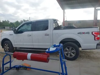 2019 Ford F-150 XL with VIN 1FTEW1E50KFA47687, listed as a IAAI auction lot 42021043 with 129,337 mi miles. Bid and sale history available at carsss.com. Image 14.