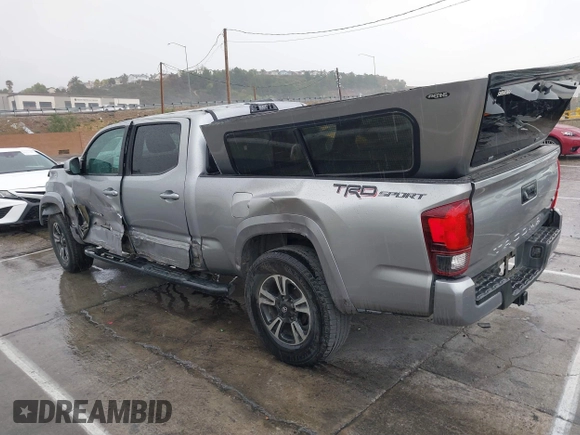 2018 Toyota Tacoma SR5 with VIN 3TMBZ5DN0JM012259, listed as a IAAI auction lot 41709709 with Not provided miles and . Bid and sale history available at DreamBid. Image 3.