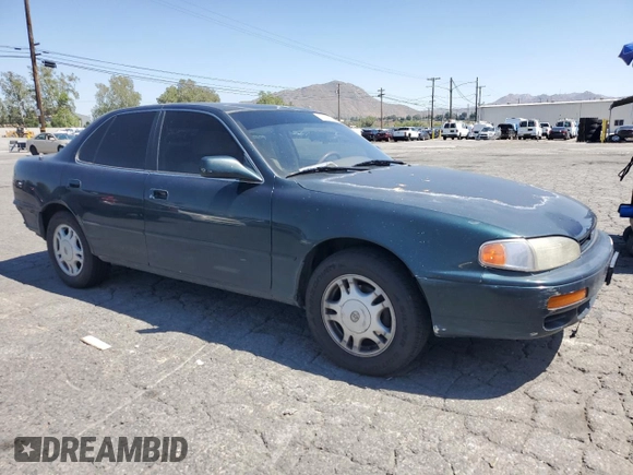 1995 Toyota Camry LE with VIN JT2GK12EXS0123355, listed as a Copart auction lot 53195364 with 171,510 mi miles and Salvage Title. Bid and sale history available at carsss.com. Image 4.