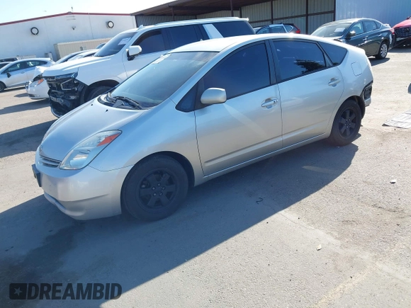 2005 Toyota Prius z VIN JTDKB20UX53080527, wystawiony jako IAAI lot #41831153 z przebiegiem 256 327 mil mil oraz . Historia ofert i sprzedaży dostępna na DreamBid. Obrazek 18.