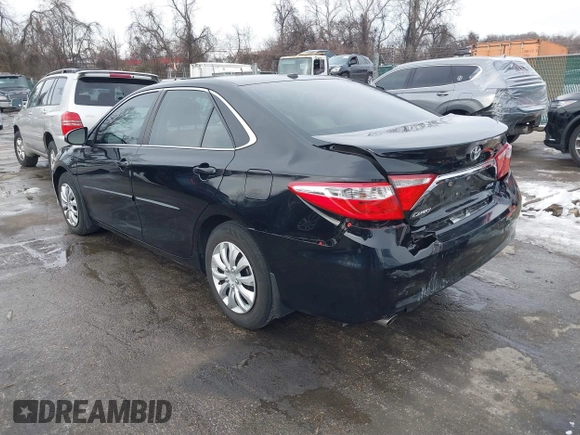 2016 Toyota Camry XSE with VIN 4T1BK1FKXGU030459, listed as a IAAI auction lot 41249705 with 190,531 mi miles. Bid and sale history available at carsss.com. Image 3.
