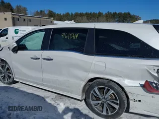2023 Honda Odyssey Touring with VIN 5FNRL6H81PB008129, listed as a IAAI auction lot 41610714 with 57,273 mi miles and . Bid and sale history available at DreamBid. Image 14.