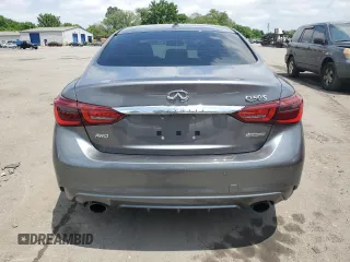 2019 Infiniti Q50 Luxe with VIN JN1EV7AR7KM591889, listed as a Copart auction lot 61304425 with 73,712 mi miles and Salvage title. Bid and sale history available at DreamBid. Image 6.