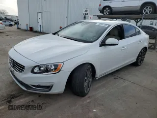 2015 Volvo S60 T5 Drive-E Platinum with VIN YV140MFD7F2301858, listed as a Copart auction lot 44586105 with 50,575 mi miles and Salvage Title. Bid and sale history available at carsss.com. Image 1.