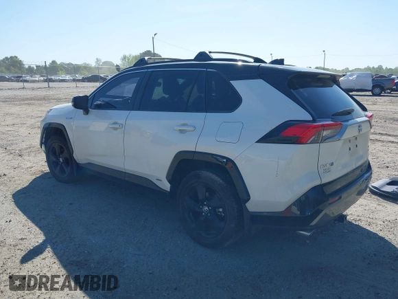 2021 Toyota RAV4 Hybrid XSE with VIN JTME6RFV4MJ008825, listed as a IAAI auction lot 42060148 with 91,129 mi miles and . Bid and sale history available at DreamBid. Image 3.