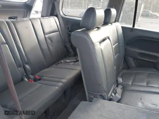 2006 Honda Pilot EX-L with VIN 5FNYF18516B002860, listed as a IAAI auction lot 41963343 with 202,799 mi miles. Bid and sale history available at carsss.com. Image 8.