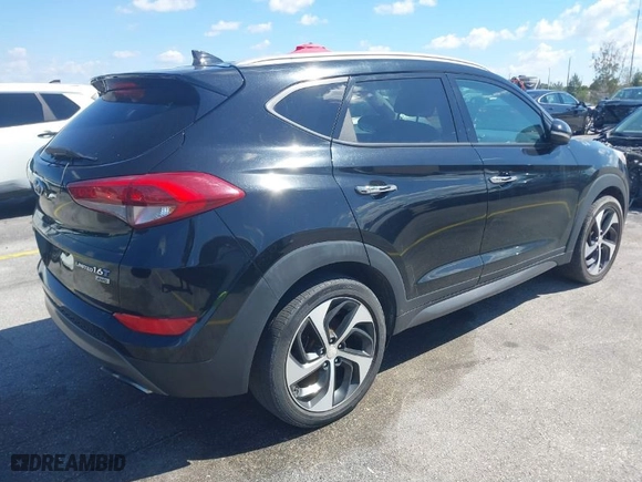 2016 Hyundai Tucson Eco with VIN KM8J3CA21GU175904, listed as a IAAI auction lot 41898678 with 117,985 mi miles. Bid and sale history available at carsss.com. Image 4.