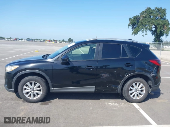 2014 Mazda CX-5 Sport z VIN JM3KE2BE8E0371775, wystawiony jako IAAI lot #42111417 z przebiegiem 150 932 mil mil oraz . Historia ofert i sprzedaży dostępna na DreamBid. Obrazek 14.