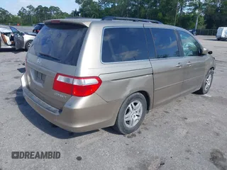 2005 Honda Odyssey EX with VIN 5FNRL38495B401742, listed as a IAAI auction lot 42133434 with 162,161 mi miles and . Bid and sale history available at carsss.com. Image 4.