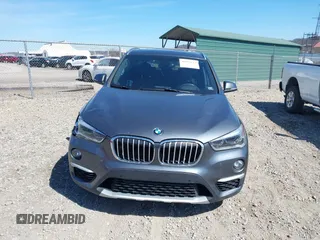 2017 BMW X1 sDrive28i with VIN WBXHU7C37H5H32815, listed as a IAAI auction lot 41837113 with 67,097 mi miles. Bid and sale history available at carsss.com. Image 12.
