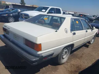 1985 Maserati Quattroporte z VIN ZAMBC1103FA305124, wystawiony jako IAAI lot #42164927 z przebiegiem 117 000 mil mil oraz . Historia ofert i sprzedaży dostępna na DreamBid. Obrazek 4.