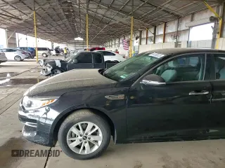 2017 Kia Optima LX z VIN 5XXGT4L31HG164323, wystawiony jako Copart lot #59189335 z przebiegiem 60 354 mil mil oraz Szkoda całkowita • Salvage title. Historia ofert i sprzedaży dostępna na DreamBid. Obrazek 13.