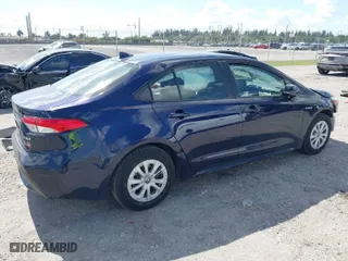 2020 Toyota Corolla Hybrid LE with VIN JTDEBRBE8LJ031556, listed as a IAAI auction lot 41576129 with 103,989 mi miles. Bid and sale history available at carsss.com. Image 4.