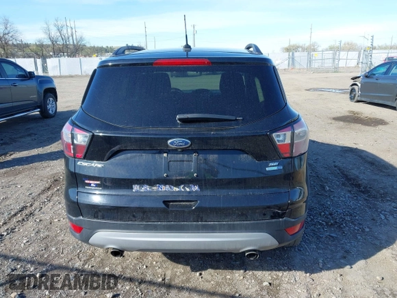 2018 Ford Escape SE z VIN 1FMCU9GD5JUB15259, wystawiony jako IAAI lot #42182040 z przebiegiem 122 194 mil mil oraz . Historia ofert i sprzedaży dostępna na DreamBid. Obrazek 17.