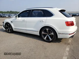 2019 Bentley Bentayga V8 z VIN SJAAM2ZV4KC026896, wystawiony jako Copart lot #57332313 z przebiegiem Nie podano mil oraz . Historia ofert i sprzedaży dostępna na DreamBid. Obrazek 2.