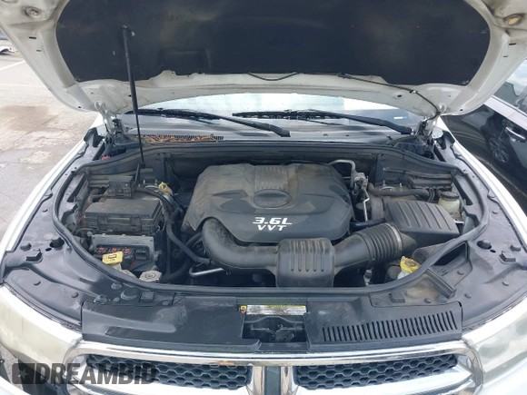 2013 Dodge Durango SXT z VIN 1C4RDHAG9DC530204, wystawiony jako IAAI lot #42128529 z przebiegiem 233 539 mil mil oraz . Historia ofert i sprzedaży dostępna na DreamBid. Obrazek 10.