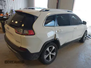 2019 Jeep Cherokee Limited z VIN 1C4PJMDN8KD179523, wystawiony jako IAAI lot #42094656 z przebiegiem 137 709 mil mil oraz . Historia ofert i sprzedaży dostępna na DreamBid. Obrazek 4.