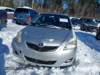 2009 Toyota Yaris with VIN JTDBT903191334821, listed as a IAAI auction lot 41598934 with 235,248 mi miles. Bid and sale history available at carsss.com. Image 6.