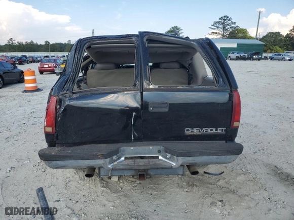 1999 Chevrolet Tahoe Z71 with VIN 1GNEK13R1XJ380316, listed as a Copart auction lot 68505524 with 242,542 mi miles and Salvage Title. Bid and sale history available at carsss.com. Image 6.