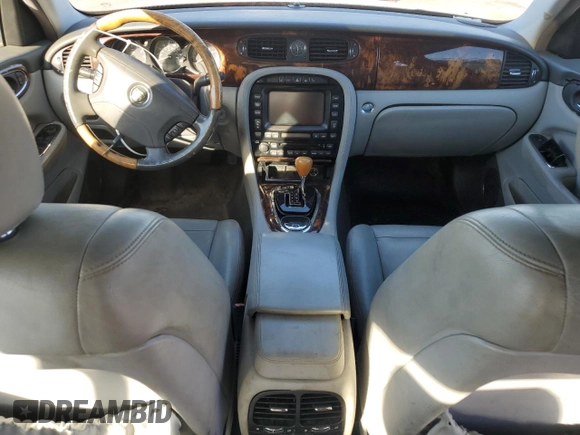 2005 Jaguar XJ with VIN SAJWA79C95SG45730, listed as a Copart auction lot 77764354 with 0 mi miles and Clean Title. Bid and sale history available at carsss.com. Image 8.
