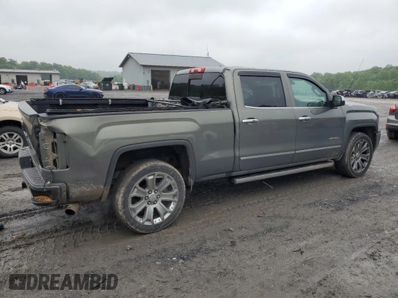 2017 GMC Sierra 1500 Denali z VIN 3GTU2PEJ1HG293825, wystawiony jako Copart lot #56851725 z przebiegiem 91 439 mil mil oraz Szkoda całkowita • Salvage title. Historia ofert i sprzedaży dostępna na DreamBid. Obrazek 3.