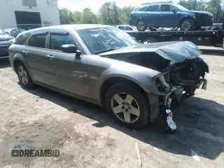 2005 Dodge Magnum z VIN 2D4FV48T65H514409, wystawiony jako IAAI lot #40228866 z przebiegiem 192 284 mil mil oraz . Historia ofert i sprzedaży dostępna na DreamBid. Obrazek 1.