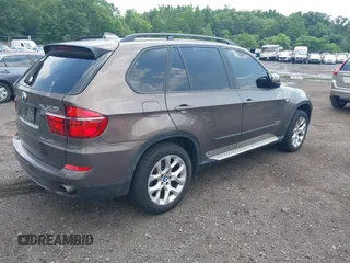 2012 BMW X5 35i with VIN 5UXZV4C59CL766849, listed as a IAAI auction lot 42749836 with 179,273 mi miles and . Bid and sale history available at DreamBid. Image 4.