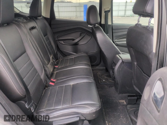 2014 Ford Escape Titanium with VIN 1FMCU9J97EUB30467, listed as a Copart auction lot 54949035 with 112,013 mi miles and Salvage Title. Bid and sale history available at DreamBid. Image 11.