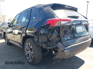 2024 Toyota RAV4 Hybrid XLE Premium with VIN JTMB6RFV0RD126685, listed as a IAAI auction lot 41870692 with 21,637 mi miles. Bid and sale history available at carsss.com. Image 6.