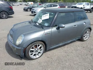 2006 MINI Hardtop S with VIN WMWRE33576TL20826, listed as a IAAI auction lot 42130614 with 160,938 mi miles and . Bid and sale history available at DreamBid. Image 2.