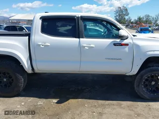 2019 Toyota Tacoma 4WD SR with VIN 3TMCZ5AN3KM207007, listed as a IAAI auction lot 41755529 with 43,203 mi miles. Bid and sale history available at carsss.com. Image 13.