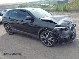 2022 BMW X2 xDrive28i z VIN WBXYJ1C02N5T58490, wystawiony jako IAAI lot #42129125 z przebiegiem 51 069 mil mil oraz . Historia ofert i sprzedaży dostępna na DreamBid. Obrazek 1.